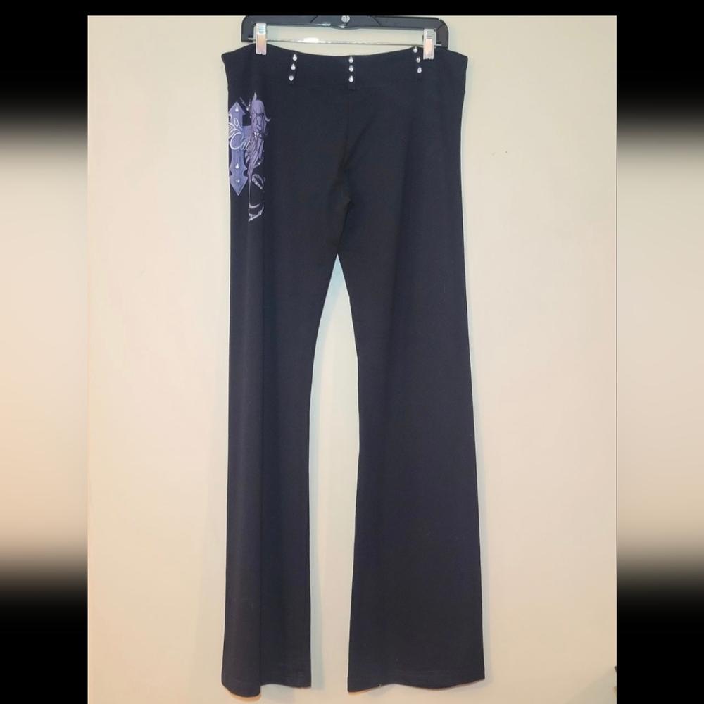 Black SoCal Pants with Purple angel wings. Womans size large